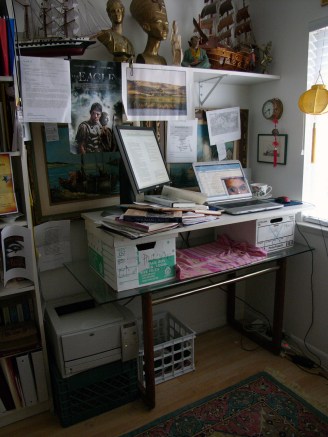 My writing space for The Black Scroll of Red Mirror Series Here's where I'm writing The Black Scroll. Notice my makeshift high desk so I can stand?