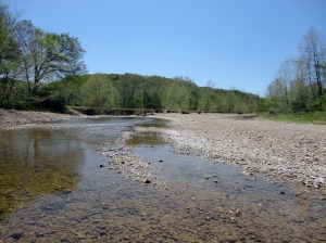 Big Buffalo Creek as it narrows from the Lake. The water can rush over the concrete slab ford in heavy weather, washing pick up trucks downstream. Note how clear the water is. You can drink it right from the creek. It's been naturally purified by the gravel bed.