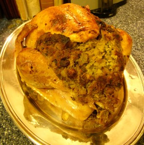 Roast turkey bursting with oyster cornbread dressing.